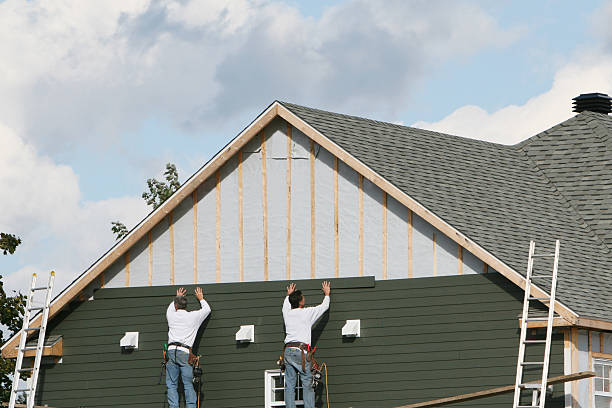 Professional Storm Damage Siding Repair technician working in Stoneville, NC